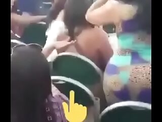 shaking her thick ass and guzzling a beer